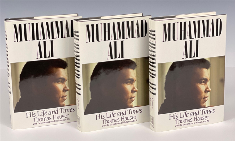 Group of Three Muhammad Ali Signed 1991 Books <em>Muhammad Ali: His Life and Times</em>