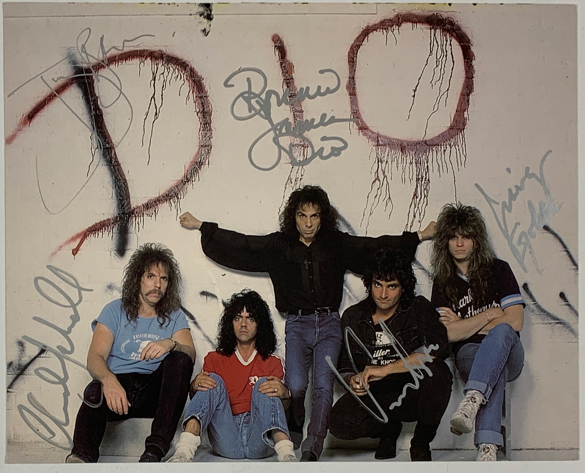 Lot Detail - DIO Band Signed 8 x 10 Inch Photo – with Ronnie James Dio,  Vinny Appice, Jimmy Bain, Claude Schnell and Craig Goldie
