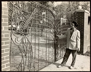 Incredible Oversized 11 x 14 Inch 1957 News Service Photo of Elvis Presley at the Gates of Graceland