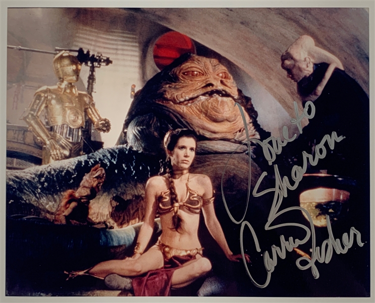 Carrie Fisher Signed 8 x 10 as Princess Leia (<em>Return of the Jedi</em>) in Jabba the Hutts Lair (BAS)