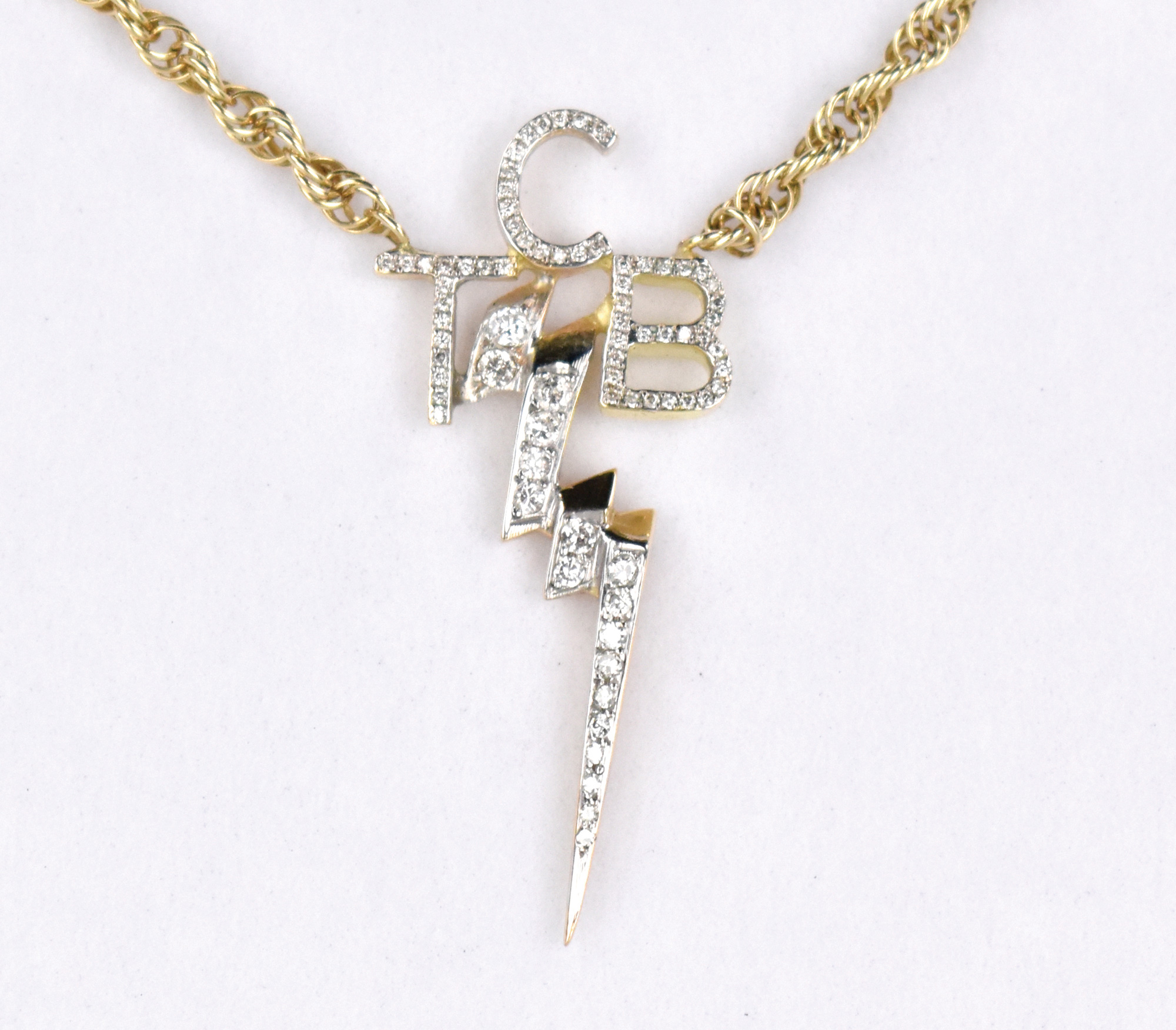 Elvis Jewellery - 'TCB' Pendant – 9 Karat Gold – Small