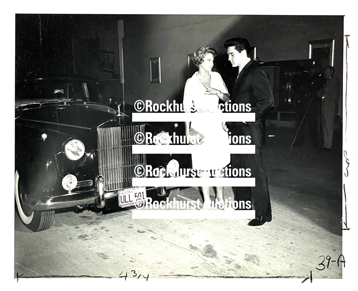 1960 Elvis Presley and Juliet Prowse Original News Service Photo with His New Rolls Royce at Special Screening of <em>G.I. Blues</em>