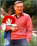 Hugh Hefner Signed 8 x 10 Photo - Holding a Raggedy Ann Doll (BAS)