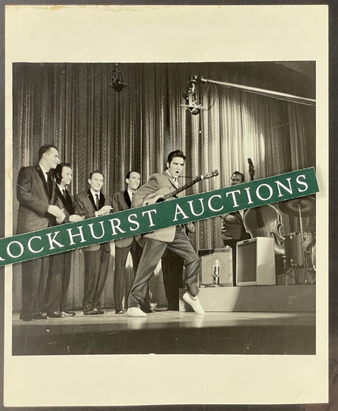 1956 Elvis Presley Original News Service Photograph Singing "Hound Dog" from October 28, 1957 <em>Ed Sullivan Show</em>