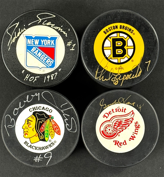 NHL Hall of Famers Signed Pucks (4) Incl. Gordie Howe, Bobby Hull, Phil Esposito and Bobby Hull (Beckett Authentic)