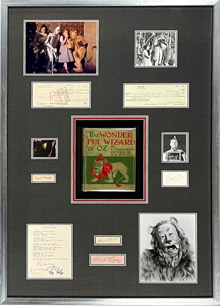 <em>Wizard of Oz</em> Signature Display Incl. First Edition <em>The Wonderful Wizard of Oz</em> with Judy Garland, Bert Lahr, Jack Haley, Ray Bolger, Margaret Hamilton and Buddy Ebsen (JSA)