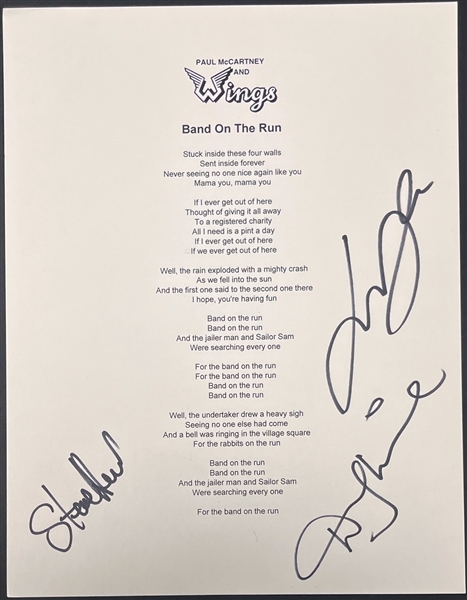 Denny Laine, Steve Holley and Laurence Juber (Paul McCartney and Wings) Signed "Band on the Run" Lyric Sheet (Beckett Authentic)